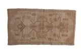 Vintage Distressed Oushak rug mat, shadow medallion with faded floral arabesques in beige tones.