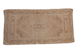Vintage distressed Oushak rug with faded hexagonal medallion, neutral beige tones, 1'11