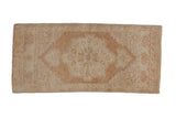 Distressed vintage Oushak rug mat, pale copper roundel medallion with blossoms on an ivory field, 1'6