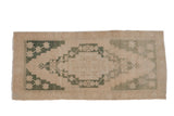 Vintage Distressed Oushak rug runner, beige and dusty emerald geometric medallion. 1'9