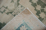Original intact side cord selvage and woven reverse foundation of the vintage Oushak rug.