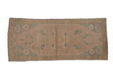 Distressed vintage Oushak runner, cream, mint, and saffron roundel medallion with floral arabesques, 1'9