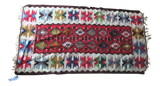 Vintage Turkish Kilim flatweave rug with a red geometric central field and colorful star patterns.