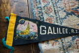 Detail of vintage Galilee felt pennant showing yellow binding, teal tie, and sailboat graphic.