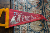 Red felt Forest Park Zoo pennant showing white 'Springfield, Mass.' text and monkey.
