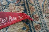 Vintage Forest Park Zoo Springfield Mass felt pennant, showing white text on aged red felt.