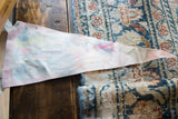 Reverse side of the vintage felt pennant showing staining and color bleed.