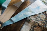 Detail of the mottled blue and white staining on the reverse side of the vintage pennant.