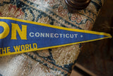 Vintage blue felt Groton Connecticut pennant, yellow trim frames white 'CONNECTICUT' text and star.