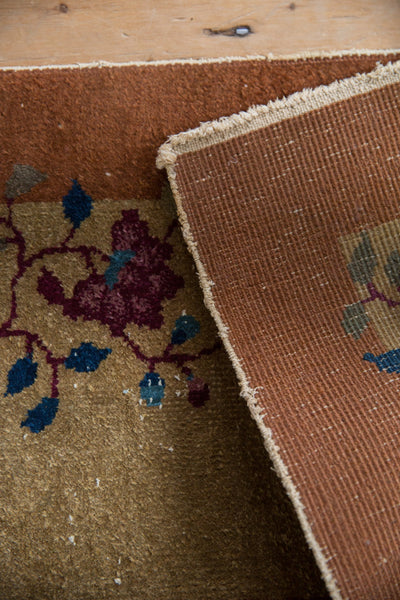 Detail of the woven back and original side cord selvage on a vintage Nichols Art Deco rug mat.