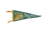 Vintage Sault Ste Marie felt pennant in dark green, featuring a colorful Soo Locks boat scene.