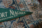 Detail of the felt texture and lettering on the vintage Fort Niagara pennant.