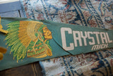 Vintage Crystal Falls Michigan felt pennant, 'CRYSTAL MICH.' cream lettering.