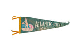Vintage Atlantic City felt pennant with a mid-century bather graphic on teal, 9x26.