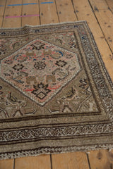 Herati and mahi-mahi motifs with short pile height in dusty rose and sapphire blue.