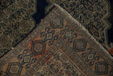 Antique Senneh rug corner, showing tattered fringe and fine hand-knotted weave reverse.