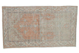 Vintage distressed Oushak runner with a prayer design in tangerine, beige, and slate.