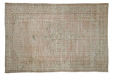 Vintage distressed Oushak rug with faded scrolling medallion, ivory, sage, and blush tones, 6'4