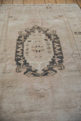 Soft, lustrous pile texture of vintage distressed Oushak rug.