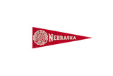 Vintage Nebraska University red felt pennant banner with white school crest.