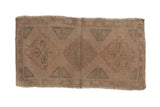 Vintage distressed Oushak rug with a triple center medallion in faded seafoam green and soft ivory.