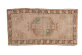 Distressed vintage Oushak rug, faded central medallion in pale turquoise and copper, 1'8