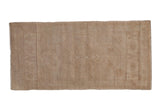 Distressed vintage Oushak rug runner, subtle tone-on-tone medallion and niches in soft beige and sand.