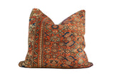 Reclaimed vintage Persian rug pillow featuring rust coral, seafoam, and ivory geometric patterns, 24x24.