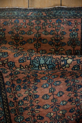 Supple handle and textured wool pile of a collector's Persian Farahan Sarouk rug.