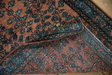Hand-knotted foundation and dusty copper floral pile of a fine Farahan Sarouk collector rug.