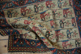 Soft, pliable wool pile of a vintage Persian bagface with detailed pictorial human figures.