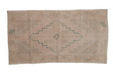 Distressed vintage Oushak runner, pale rose and seafoam green stepped medallion, 3'2