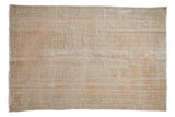 Distressed vintage Oushak carpet, cream field, worn mint green floral medallion.