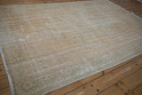 Distressed Oushak corner with exposed foundation, mint green details, intact side selvage, fringe.