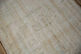 Tight hand-knotted foundation of a vintage Oushak rug reverse.