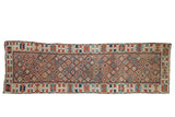 Antique Caucasian runner, late 19th century, with geometric diamond lattice and nuanced crab guls.