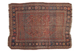 Worn vintage Persian Kamseh rug featuring madder red Herati field and navy crab guls, 5' x 6'6