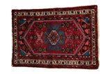 Vintage Borchalou rug, concentric medallion, floral field, brick red, sapphire blue, ivory.