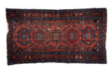 Fine vintage hand-knotted Lilihan runner, raspberry red medallion field, sapphire blue motifs. 2'9