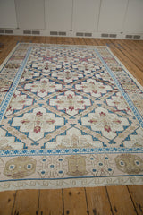 Distressed Turkish Soumac rug featuring sapphire and raspberry quatrefoil medallions, heavy abrashes.
