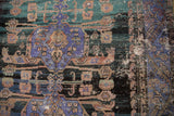 Distressed Oushak runner detail: violet Samovar arms, teal field, copper Herati, and visible foundation wear.