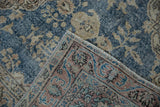 Worn blue pile of a vintage distressed Sparta runner, showing reverse pattern and fringe.