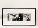 Jane and Time 1 black and white framed photograph of a woman in a kitchen.