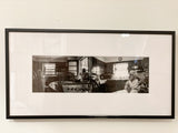 Jane and Time 2 framed black and white photograph, showing a kitchen interior and woman.