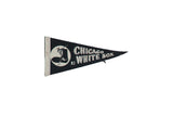 Vintage Chicago White Sox felt pennant featuring player graphic, MLB logo, 1950s, 4x9 inches.