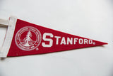 Stanford University felt flag with detailed school seal and white trim.