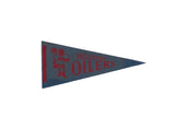 Vintage blue felt Houston Oilers pennant with red team name and player graphic, 4x9.