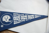 Pointed end of blue vintage Baltimore Colts felt pennant with white 