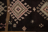 Distressed geometric Kars runner detail featuring pale blush pink, antique ivory, and charcoal brown palette.