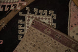 Hand-knotted foundation and reverse of a distressed Kars runner, revealing aubergine border and charcoal pile.